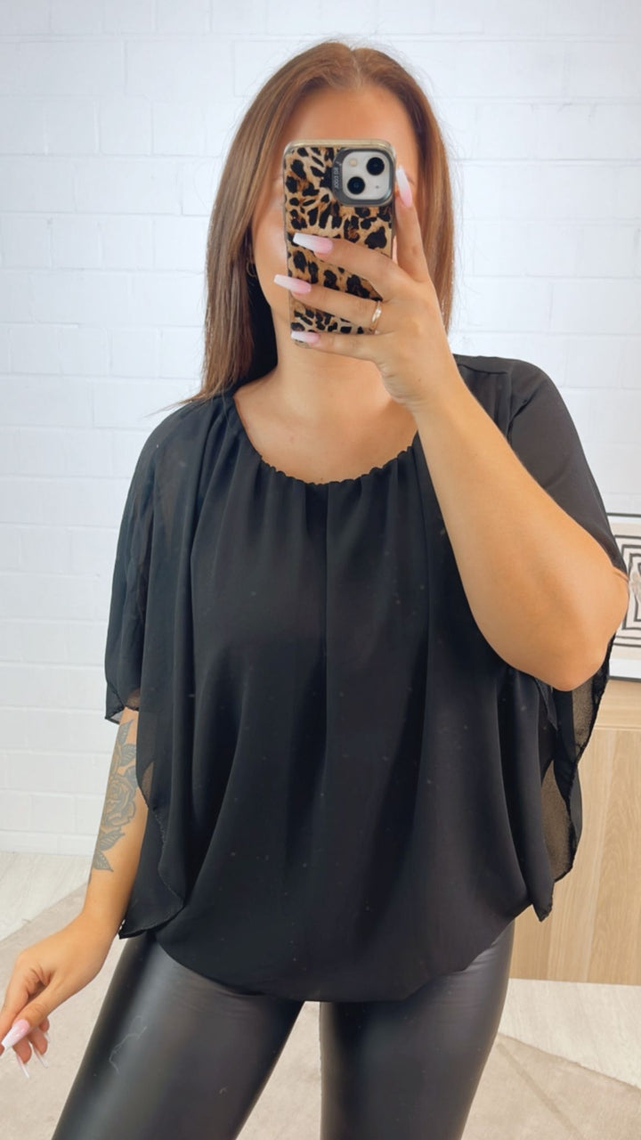 Chiffon Bluse mit locker fallenden Armen / schwarz Art.122311