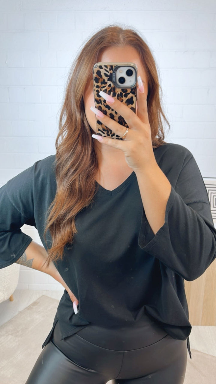 schlichtes Vokuhila Oberteil mit V-Ausschnitt, Schlitz / schwarz Art. 12344