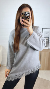 SPITZE asymmetrischer Pullover / grau Art. 13028