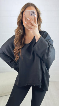 Oversize Sweater mit V-Ausschnitt / schwarz Art. 10012