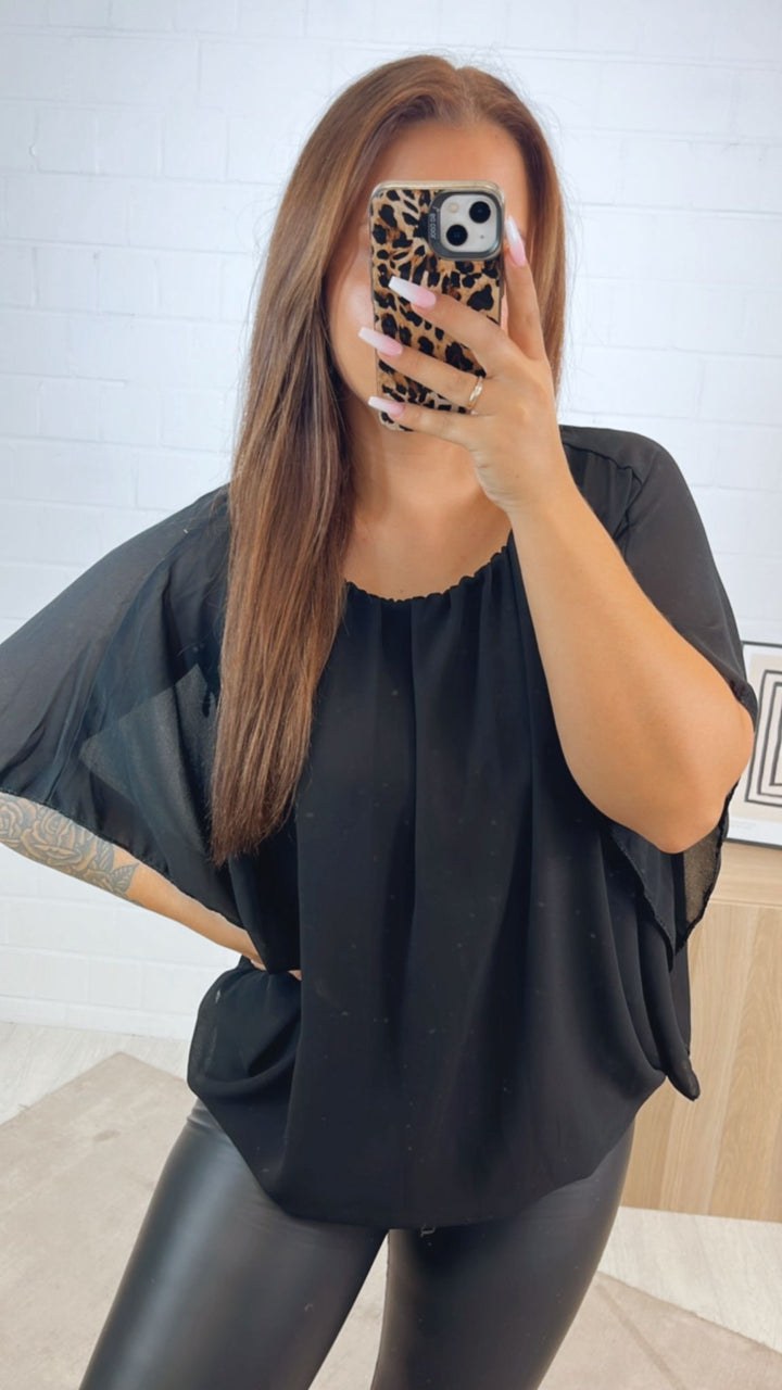 Chiffon Bluse mit locker fallenden Armen / schwarz Art.122311